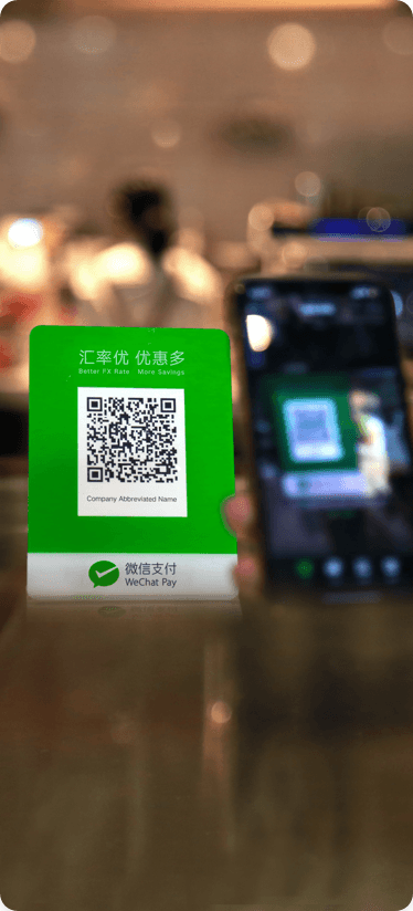 User goes to 'Scan QR Code' in WeChat and scans merchant's QR Code